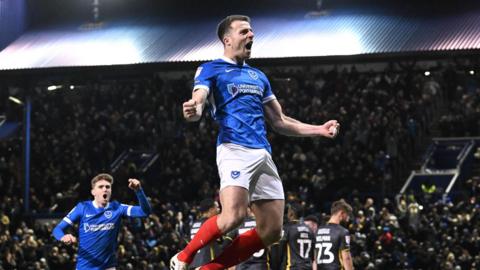Conor Shaughnessy of Portsmouth celebrates scoring at Fratton Park