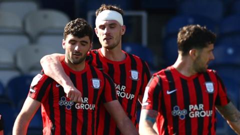 Preston celebrate scoring at QPR