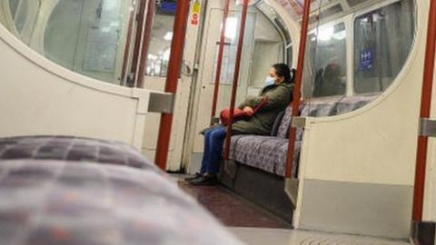 Woman alone on train