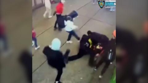 Men attacking officers