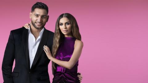 Amir Khan and Faryal Makhdoom on pink background.