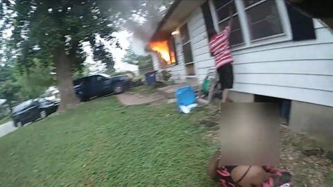 Body camera footage captured a three-year-old girl and her grandmother being pulled from the basement of their burning home.