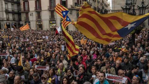 Demonstrators gather in front of the Catalan Government building