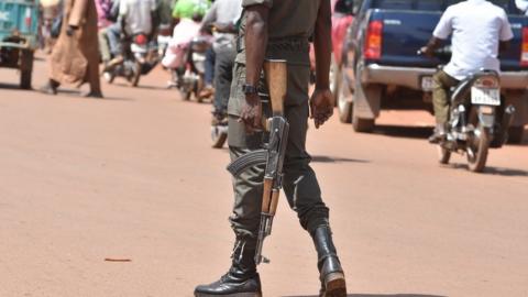 A picture taken on 29 October 2018 shows a policeman patrolling in the centre of Ouahigouya, eastern Burkina Faso.