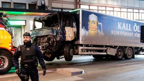 This picture taken on April 8, 2017, shows the truck that crashed into the Ahlens department store at Drottninggatan in central Stockholm the day before
