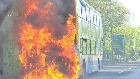 Bus fire causes congestion on busy Hull road - BBC News