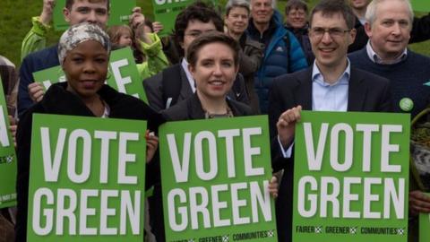 Joint Green Party leaders Adrian Ramsay and Carla Denyer stand in a housing estate in Crystal Palace