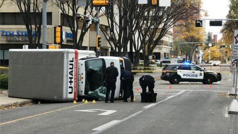 Overturned pictured of u-haul van at scene