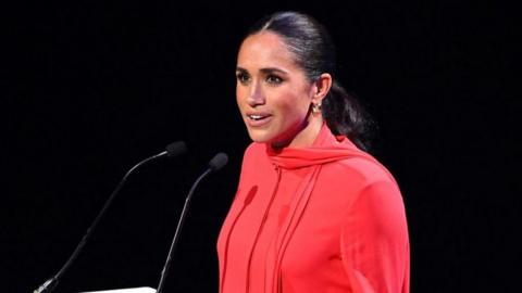 Meghan speaking at the One Young World summit