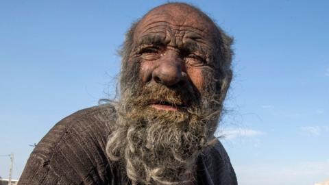 Amou Haji (uncle Haji) is pictured on the outskirts of the village of Dezhgah in the Dehram district of the southwestern Iranian Fars province, on December 28, 2018