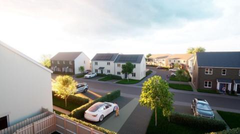 CGI of how the St Erme development could look. The design shows a number of semi detached homes, with solar panels on the roof. Each of the properties in the image has a driveway. Trees are dotted around the development. Cars are parked on the driveways.