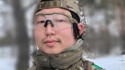 Sergeant Kim in military uniform