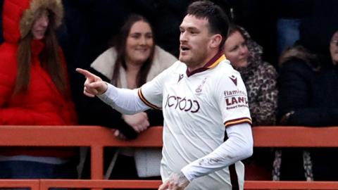 Andy Cook scores his 16th goal of the season for Bradford