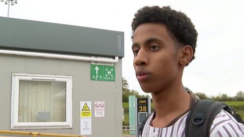 Mazen, 15, speaks to the BBC at Stansted Airport