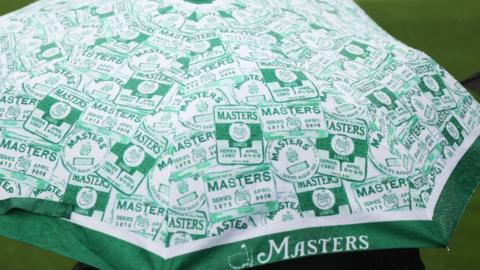 An umbrella with Masters logo