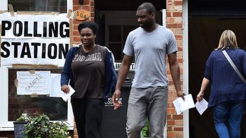 Voters at polling station in Croydon