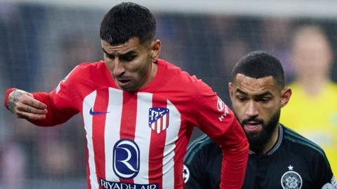 Atletico Madrid's Angel Correa and Celtic's Cameron Carter-Vickers