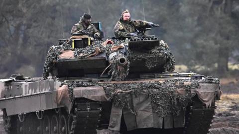 German Defence Minister Boris Pistorius rides a tank as he visits the Leopard II tanks that are due to be supplied to Ukraine at the tank brigade Lipperland of Germany's army and part of the Bundeswehr, in Augustdorf, Germany, on 1 February 2023