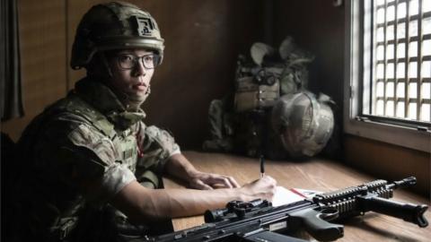 UK Armed Forces member processes evacuation applications