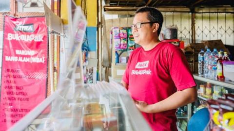 A bukalapak.com agent in his shop.