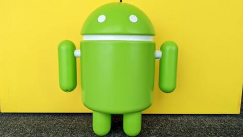 A photo of a 3d version of the android robot logo