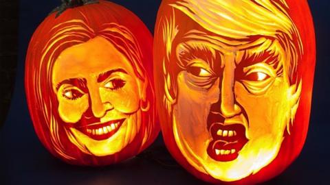 Hugh McMahon's pumpkin realisations of Hilary Clinton and Donald Trump