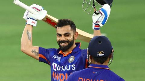 India's Virat Kohli celebrates his century against Afghanistan in the Asia Cup