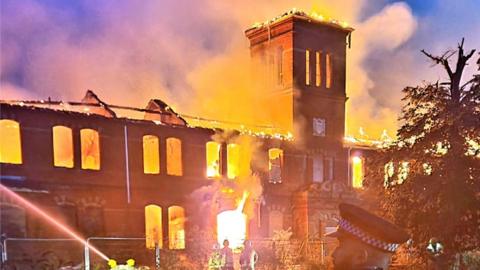 Derelict hospital on fire