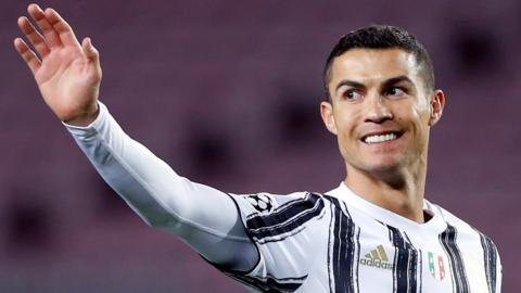 Cristiano Ronaldo celebrates scoring a penalty for Juventus against Barcelona