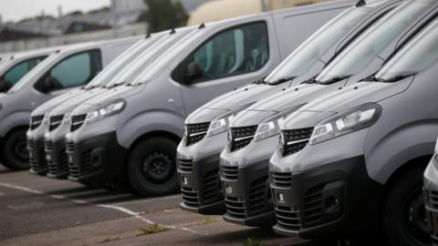 A row of newly built Vivaro vans is pictured in the distribution centre at the Vauxhall car plant in Ellesmere Port
