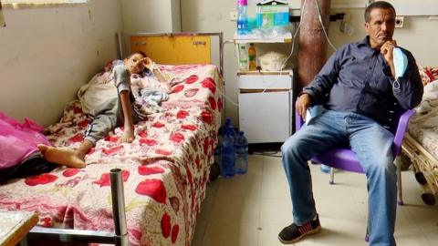 A father and son in a hospital in Tigray, Ethiopia