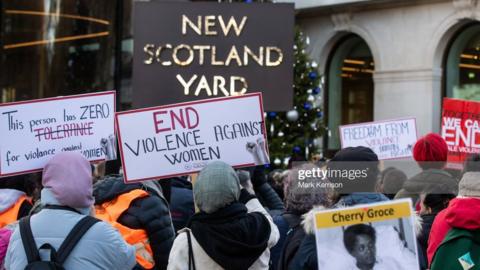 Women outside Scotland Yard