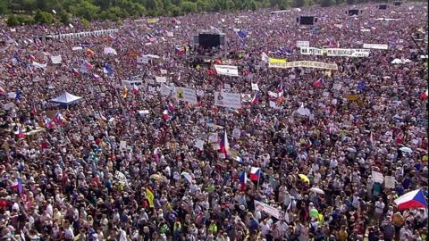 Crowds of people protest in prague