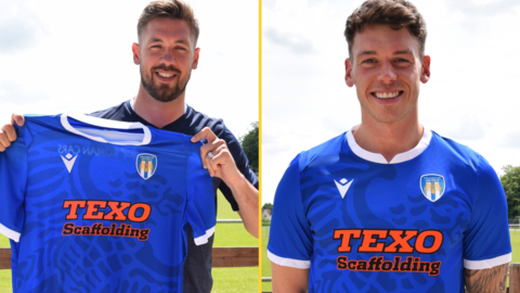 Luke Chambers (left) and Luke Hannant pose with a Colchester shirt