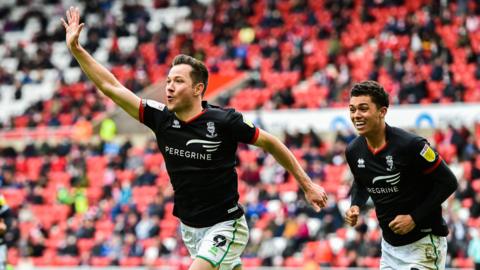 Tom Hopper celebrates