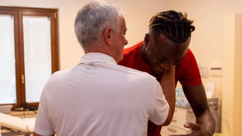 Jose Mourinho and Tammy Abraham