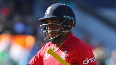 Chris Jordan walks off after being dismissed