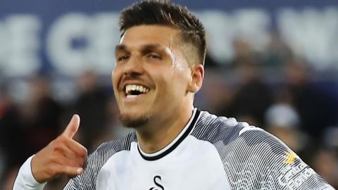 Joel Piroe celebrates after scoring against Northampton