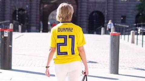 Annika Strandhall wearing Sweden football shirt with Jimmy Durmaz on the back