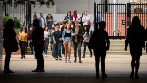 Pupils arrive to collect results