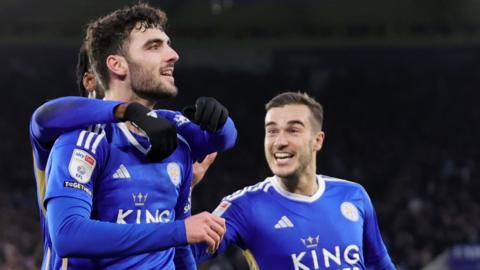 Tom Cannon celebrates scoring for Leicester against Huddersfield