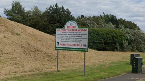 A general view of Queens Meadow Business Park's access