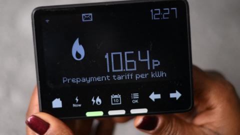A smart meter indicating it is now on a 'Prepayment tariff', in a house in London.