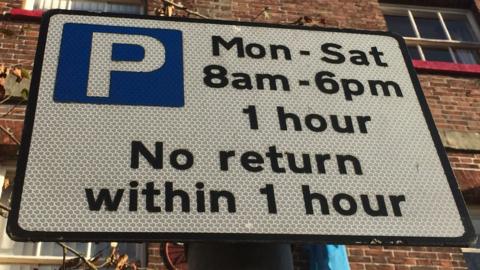 Parking sign