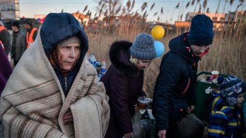 Ukrainian refugees outside