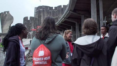 International students the view of Caerphilly castle at USW