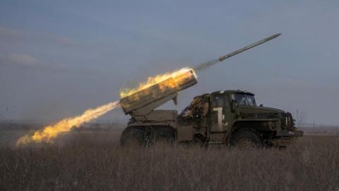 Ukrainian servicemen fire a BM-21 Grad multiple launch rocket system towards Russian positions on a frontline near the town of Marinka, amid Russia's attack on Ukraine, in Donetsk region, Ukraine, February 7, 2023