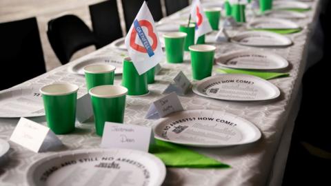 Table set for the 72 people killed by the fire