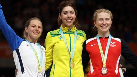 Gold medallist Australia's Georgia Baker (C), silver medallist Scotland's Neah Evans (L) and bronze medallist Wales' Eluned King