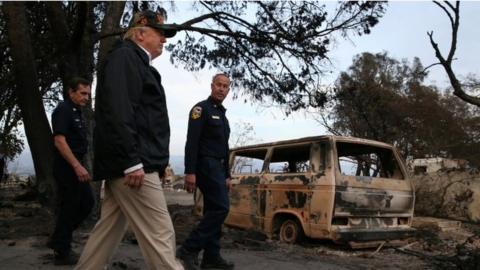 U.S. President Donald Trump surveys homes destroyed by the Woolsey fire in Malibu, California, U.S., November 17, 2018.